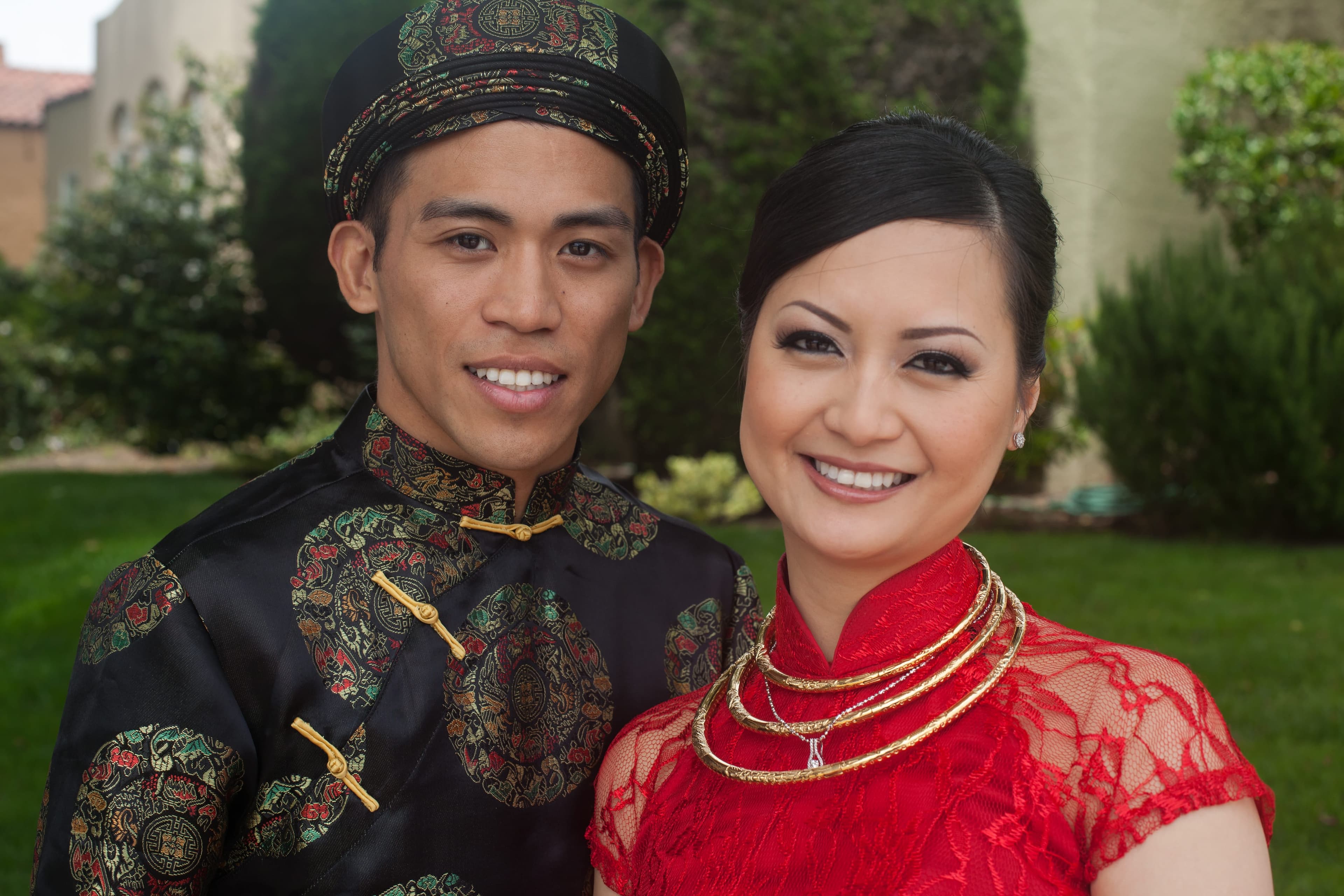 Close-up portrait of the bride and groom in traditional áo dài